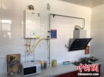 祁村居民的家中，已经更换了燃气取暖设备。 冷昊阳 摄 - 中国新闻社河北分社
