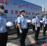 图为秦皇岛举行“一盔一带”安全守护主题活动。 刘亮 摄 - 中国新闻社河北分社