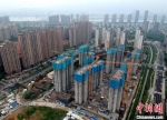 资料图：正在建设的住宅区。(无人机拍摄) 中新社记者 吕明 摄 - 中国新闻社河北分社