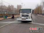 利用再生水清理街道。 白月 摄 - 中国新闻社河北分社